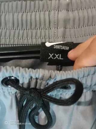 Tuta sportiva Nike grigia con cappuccio