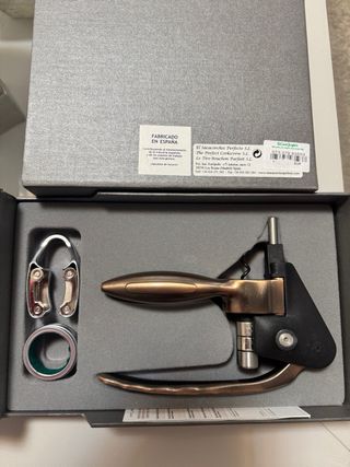 Sacacorchos con desencapsulador y anillo
