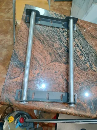 Soporte Colgador TV.