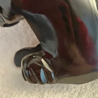 Escultura felino material negro traido de México