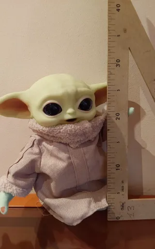 Muñeco Baby Yoda con bolso