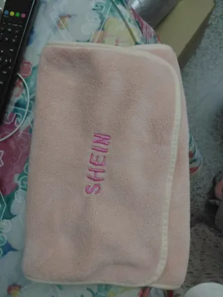 Toalla rosa de forro polar