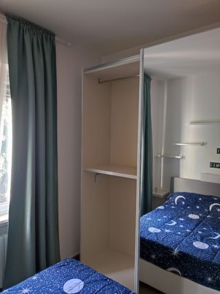 Armadio bianco ante scorrevoli specchio