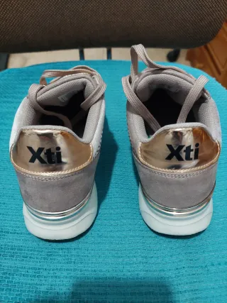 Xti Mujer