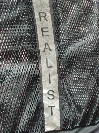 Chaqueta negra perforada T/M