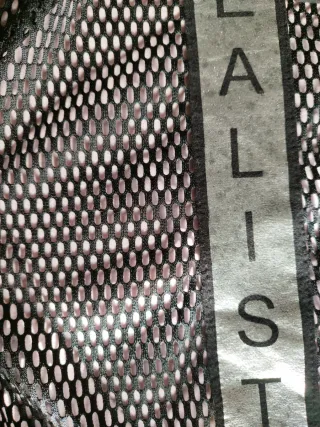 Chaqueta negra perforada T/M