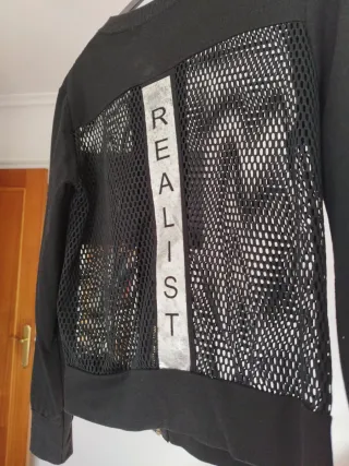 Chaqueta negra perforada T/M