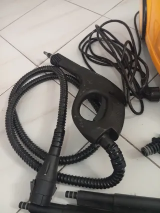 Vaporeta con plancha y accesorios