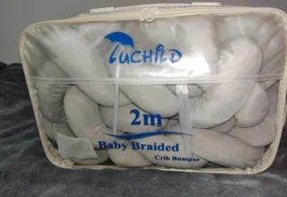 Cojín trenzado para bebé