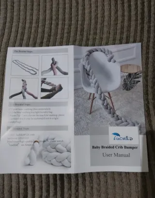 Cojín trenzado para bebé