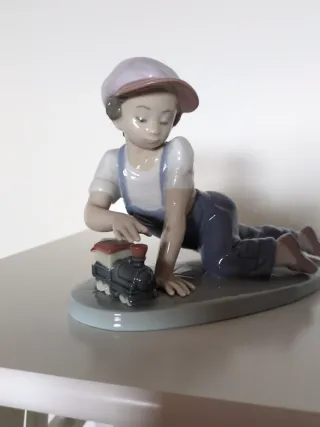 Escultura Lladro niño con cámara