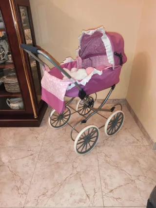 Carrito de juguete rosa