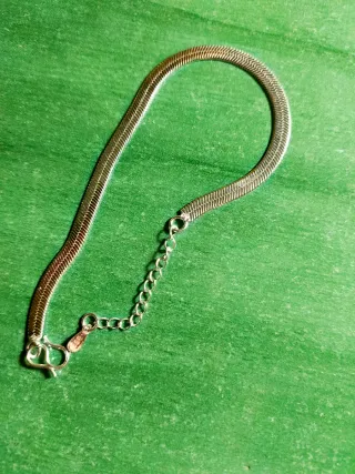 Pulsera tipo serpiente plateada
