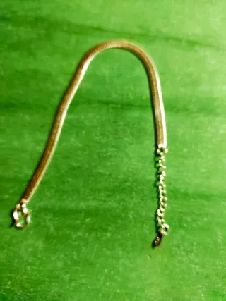 Pulsera tipo serpiente plateada