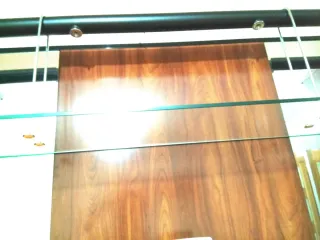 Mueble de salón madera y cristal