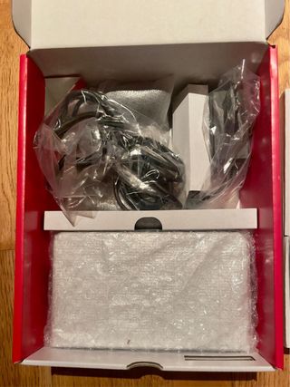 Nintendo Switch OLED Blanca y Negra + Funda