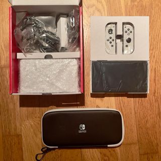 Nintendo Switch OLED Blanca y Negra + Funda