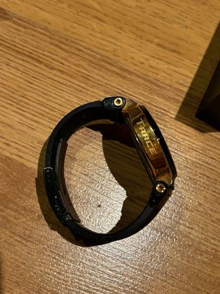 Reloj Tissot T-Race Negro y Dorado