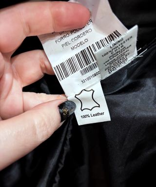 Abrigo de piel de cordero negro