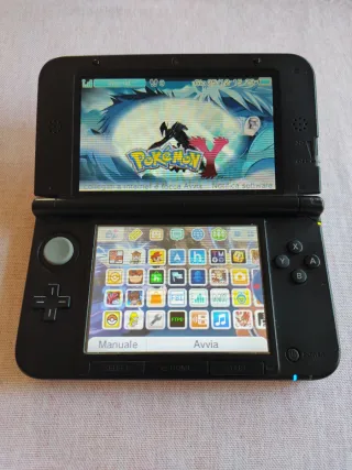 Nintendo 3DS XL con Banca Pokémon e videogiochi