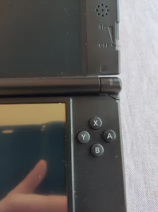 Nintendo 3DS XL con Banca Pokémon e videogiochi