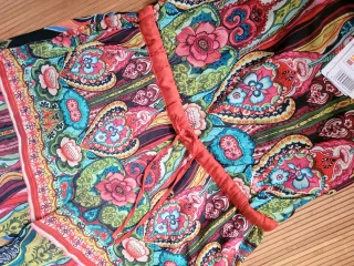 Nuevo.Mono Desigual estampado talla L