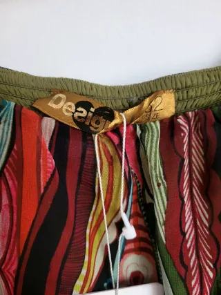 Nuevo.Mono Desigual estampado talla L