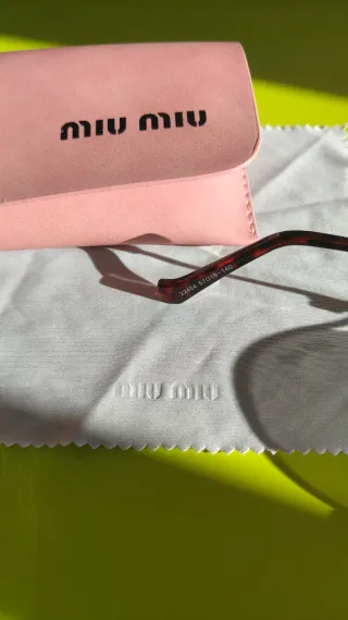 Gafas Miu Miu Vintage Doradas y Negras