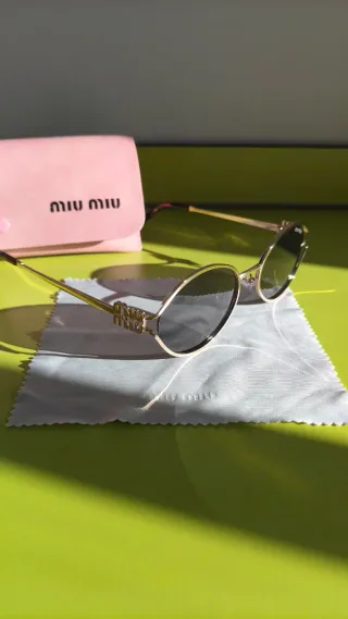 Gafas Miu Miu Vintage Doradas y Negras