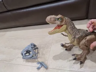 Dinosaurio T-Rex con accesorio