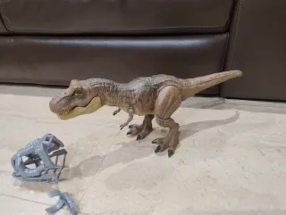 Dinosaurio T-Rex con accesorio