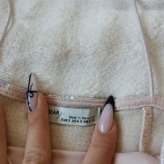 Conjunto top y falda brillante