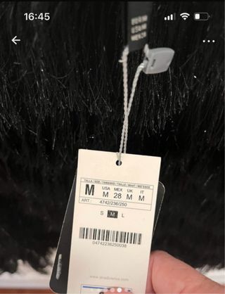 Falda Stradivarius flecos negra