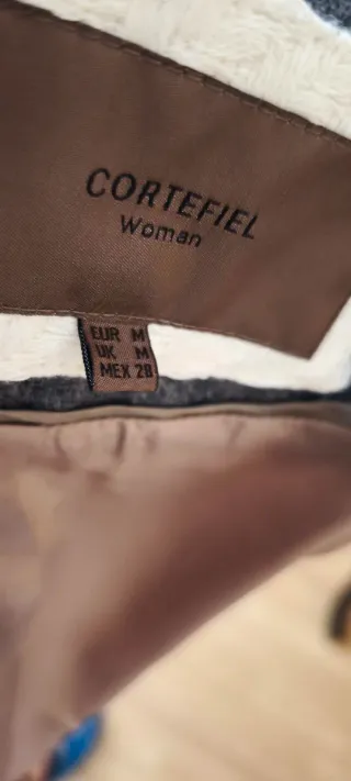 Abrigo blanco doble botonadura