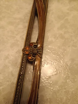 Marco de fotos metal dorado y marrón