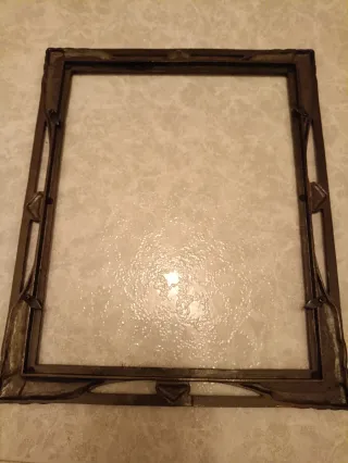 Marco de fotos metal dorado y marrón