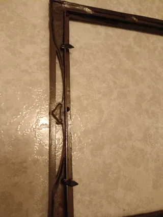 Marco de fotos metal dorado y marrón