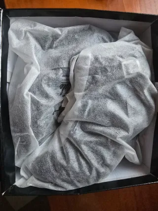 Botas de tacón negras.