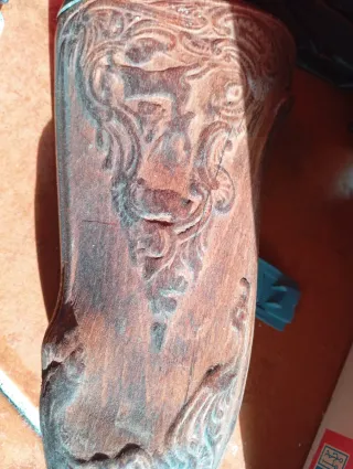 Rifle de colección tallado.tiene qué arreglar lo d