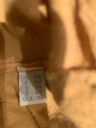 Conjunto jersey y chaqueta beige