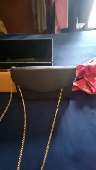 2 Carteras de fiesta doradas negra y.mostaza