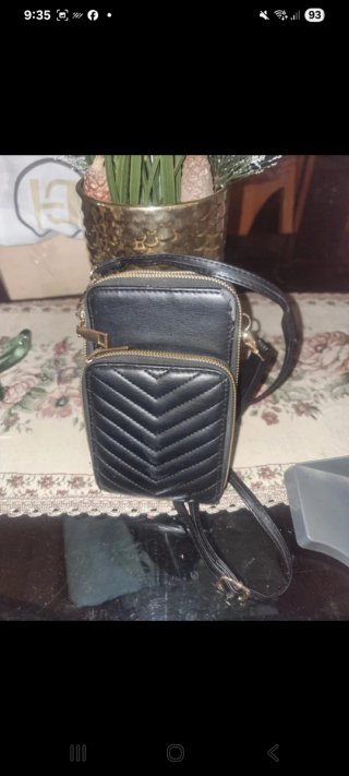Cartera de fiesta doradas negra y bolso móvil