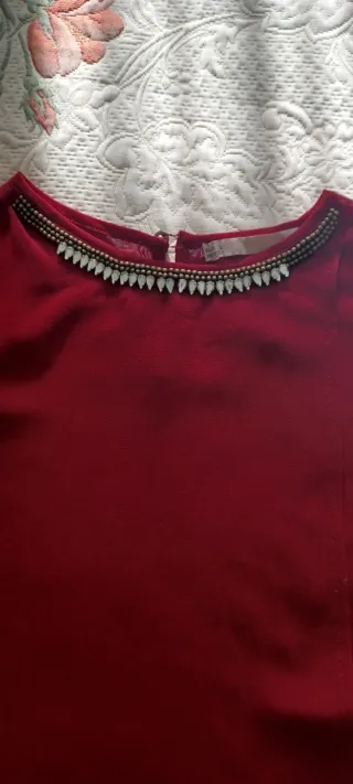 Blusa sin mangas con pedrería