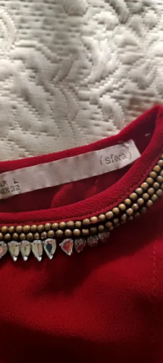 Blusa sin mangas con pedrería