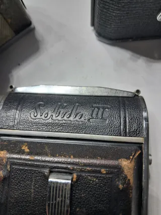 Lotto 5 macchine fotografiche e due obbiettivi