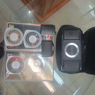 Sony PSP Nera + 4 Giochi + 2 Batterie 662076542Whts