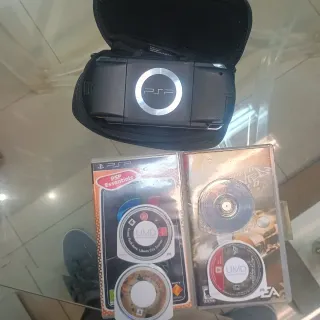 Sony PSP Nera + 4 Giochi + 2 Batterie 662076542Whts