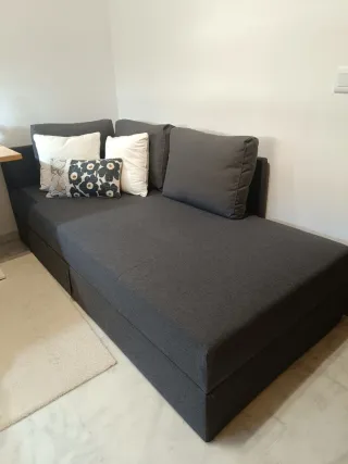 Diván Ikea gris con almacenaje