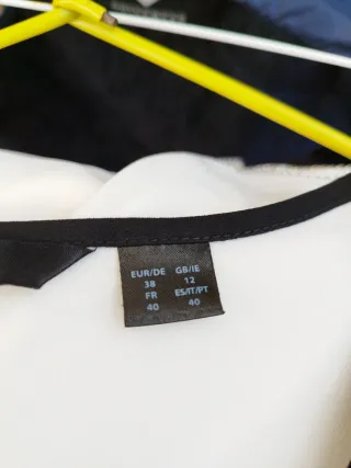 Blusa blanca con detalles plateados Blusas blanca