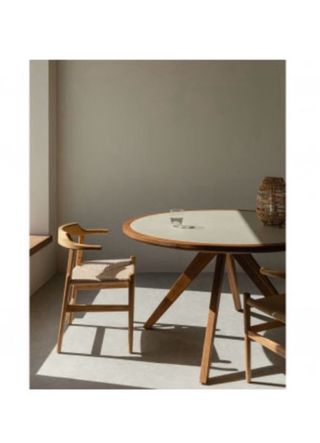 Mesa de Comedor Redonda en Cemento y Madera